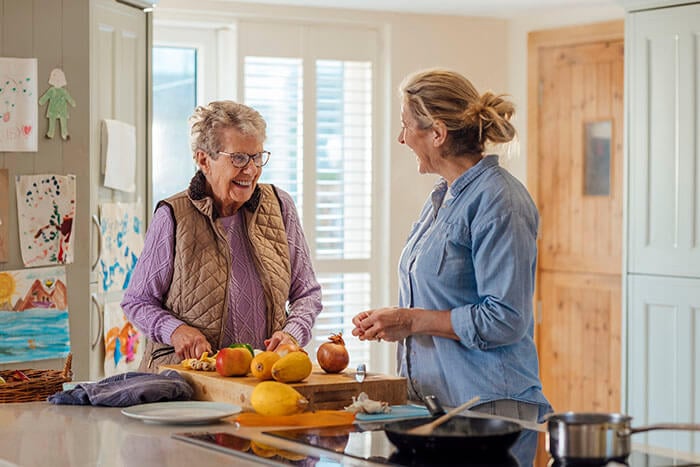 People talking in a kitchen